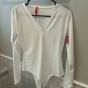 Spanx Women’s white long sleeve bodysuit NWT